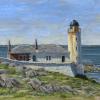 A lighthouse and attached cottages above the sea